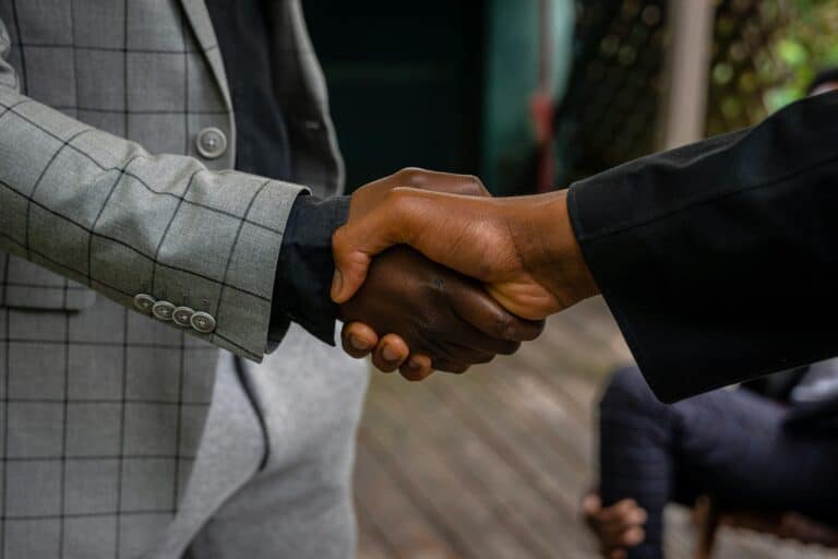 Image of hand shake illustrating trust